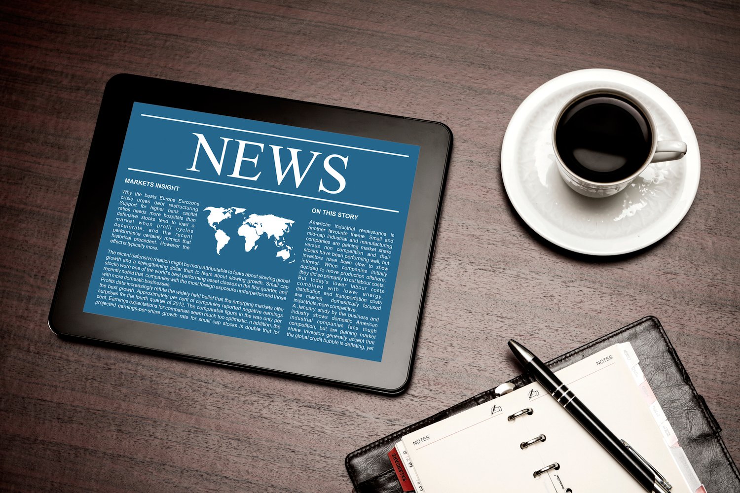 News on digital tablet. | Home