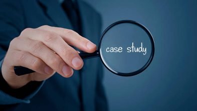 Businessman focused on case study. Businessman enlarge handwritten text case study.